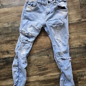 Distressed Light Blue Jeans